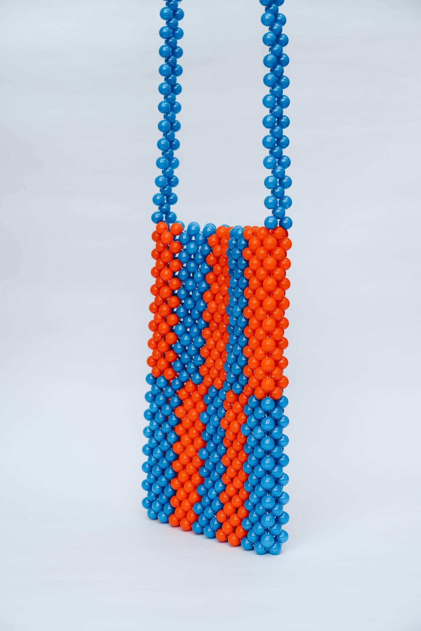 BEADED PHONE BAG - BLUE/ORANGE by HIBISCUS THE LABEL - Shop at Black Salt Co