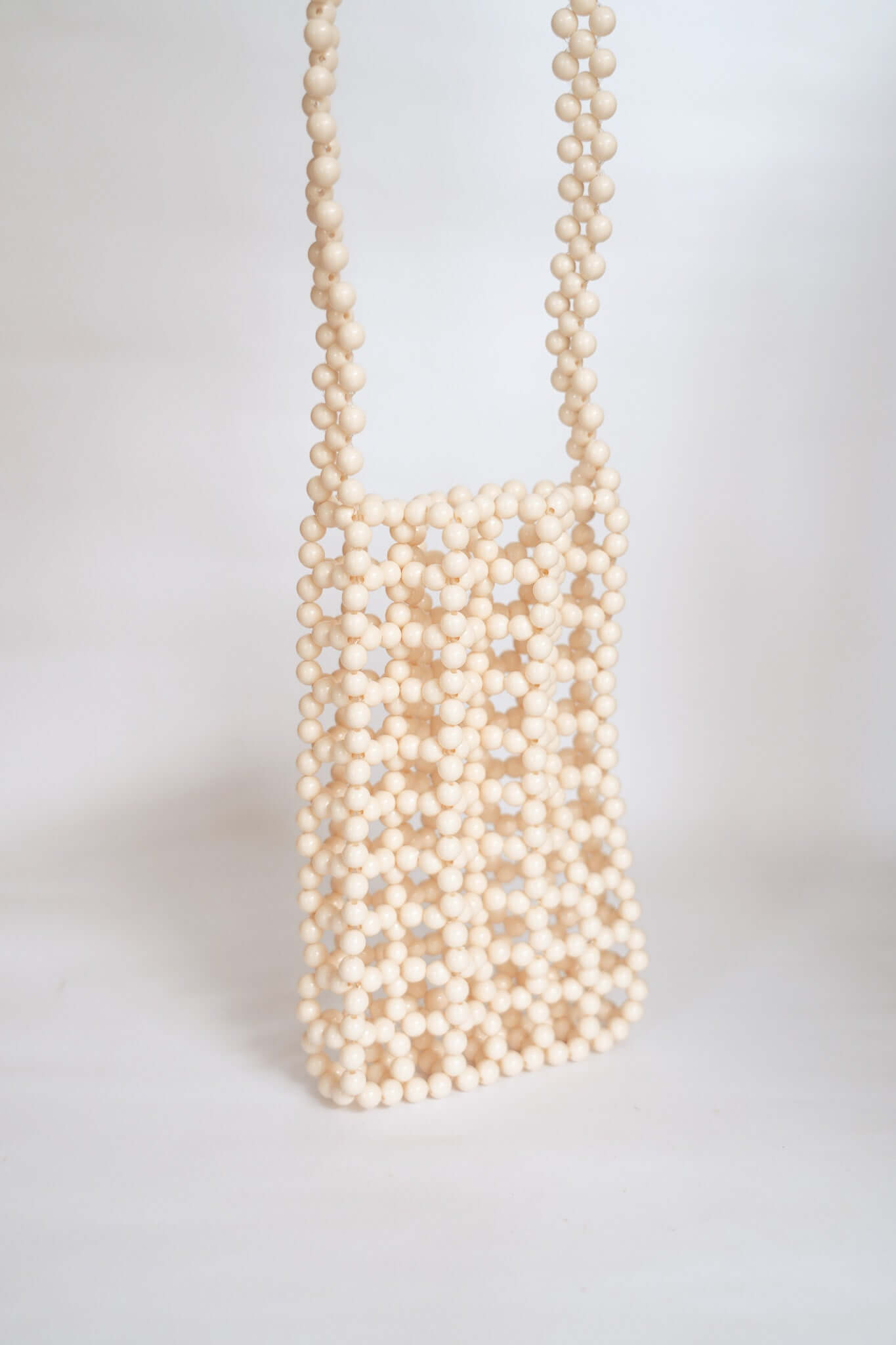 BEADED PHONE BAG - CREAM by HIBISCUS THE LABEL - Shop at Black Salt Co