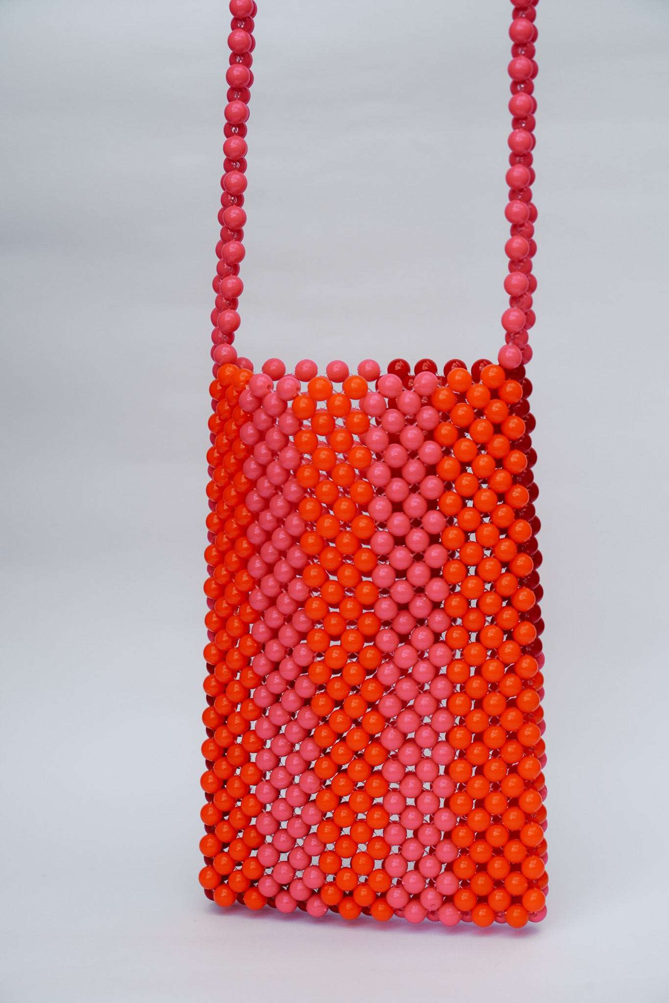 BEADED PHONE BAG - RED/PINK by HIBISCUS THE LABEL - Shop at Black Salt Co