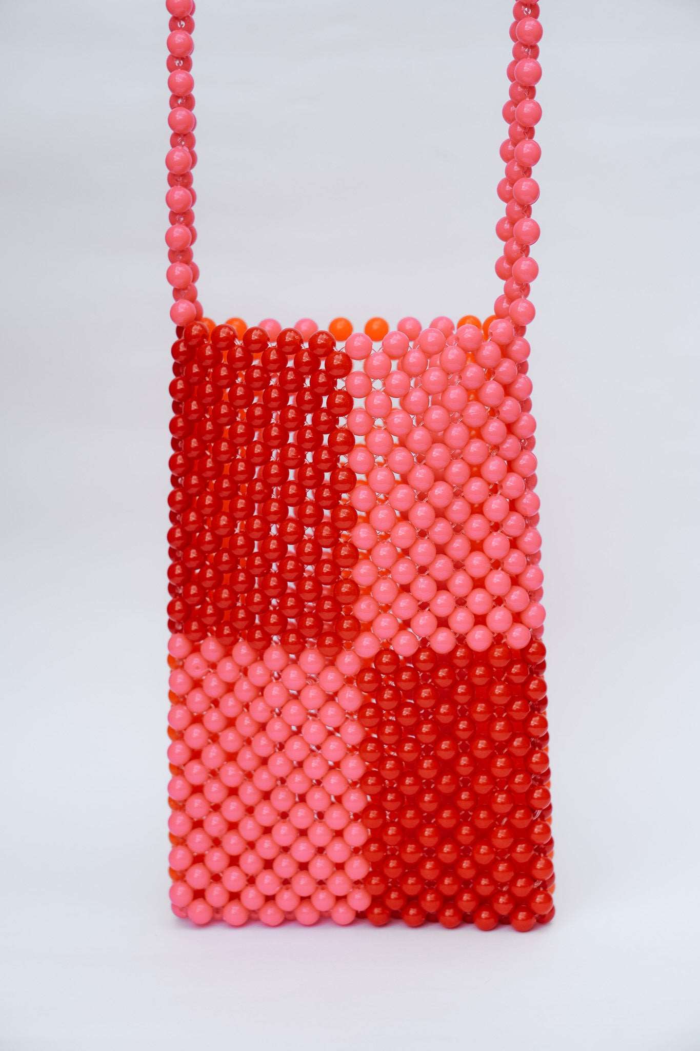 BEADED PHONE BAG - RED/PINK by HIBISCUS THE LABEL - Shop at Black Salt Co