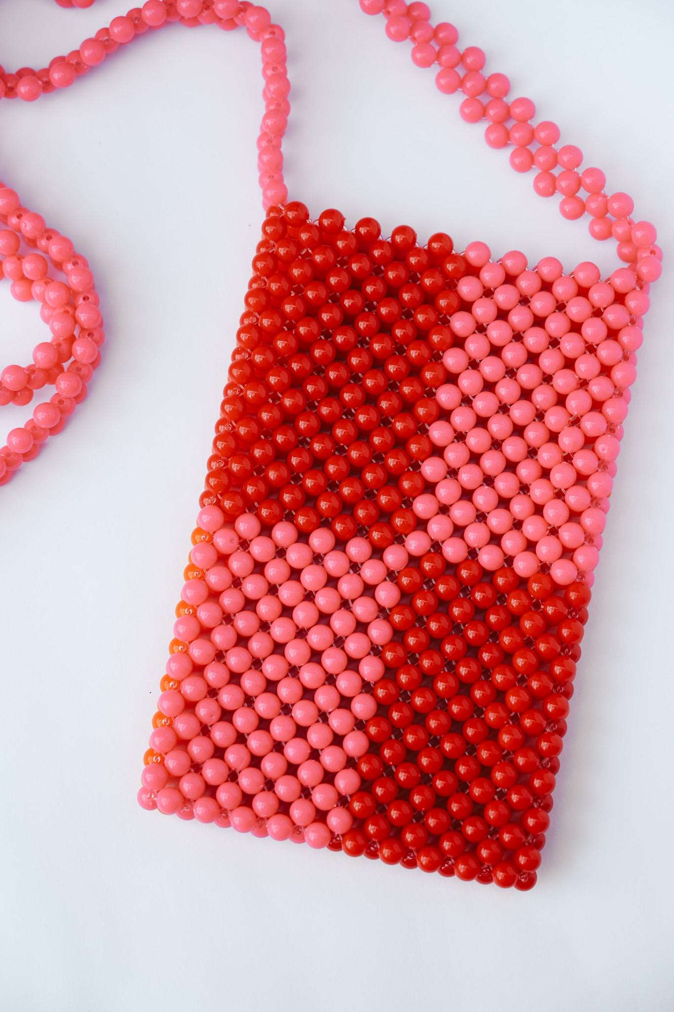 BEADED PHONE BAG - RED/PINK by HIBISCUS THE LABEL - Shop at Black Salt Co