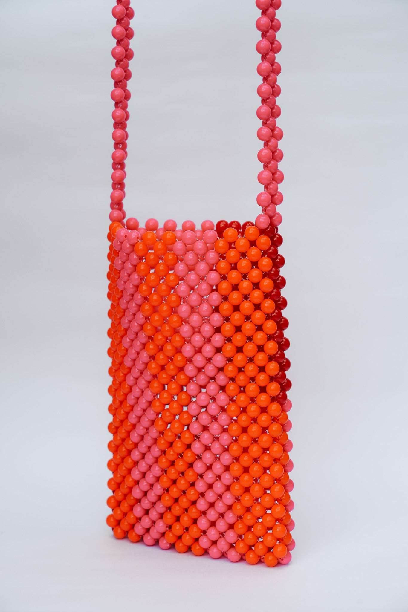 BEADED PHONE BAG - RED/PINK by HIBISCUS THE LABEL - Shop at Black Salt Co