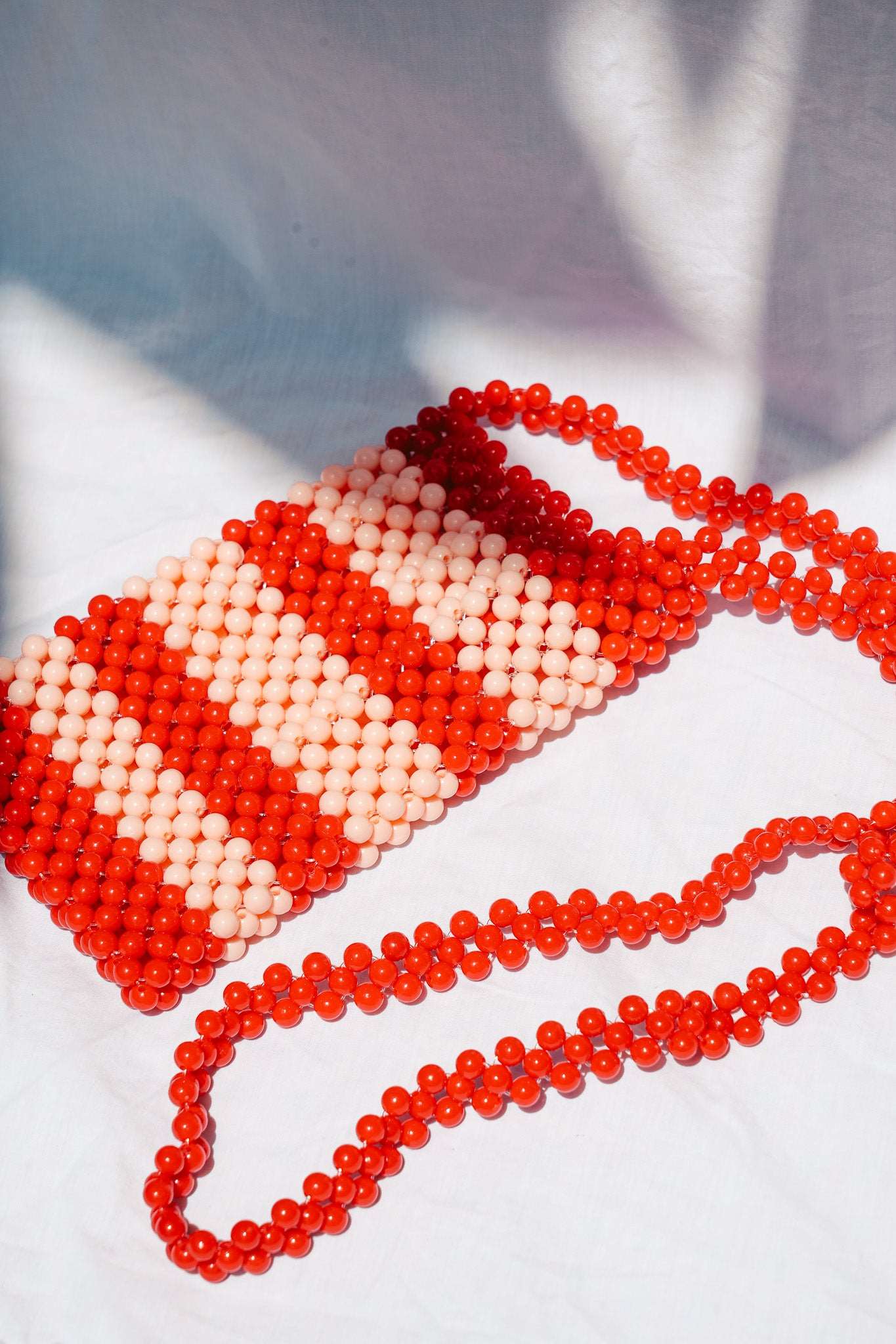 BEADED PHONE BAG - RED/PINK STRIPE by HIBISCUS THE LABEL - Shop at Black Salt Co