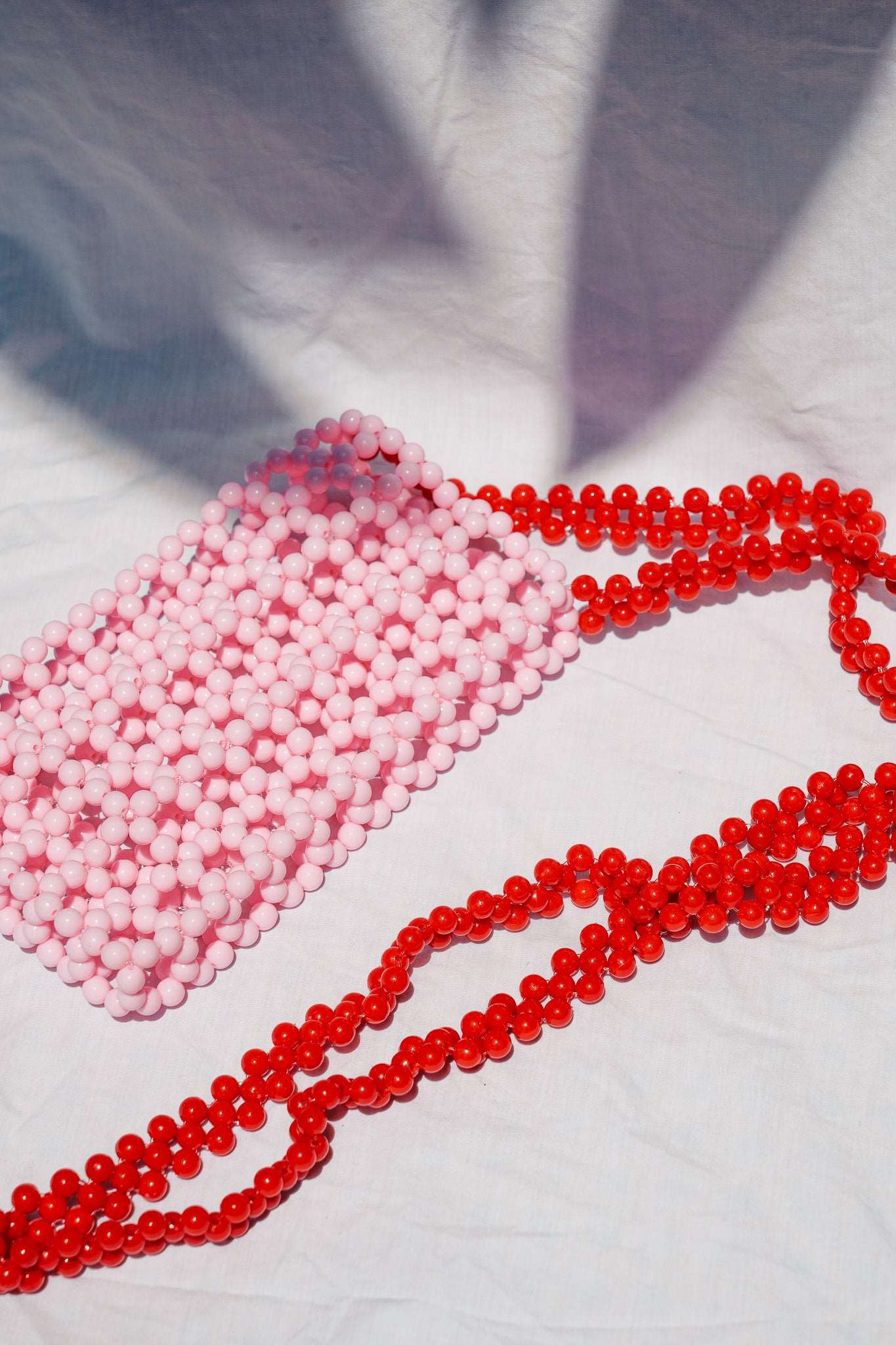 BEADED PHONE BAG - SOFT PINK & RED - HIBISCUS THE LABEL - Black Salt Co