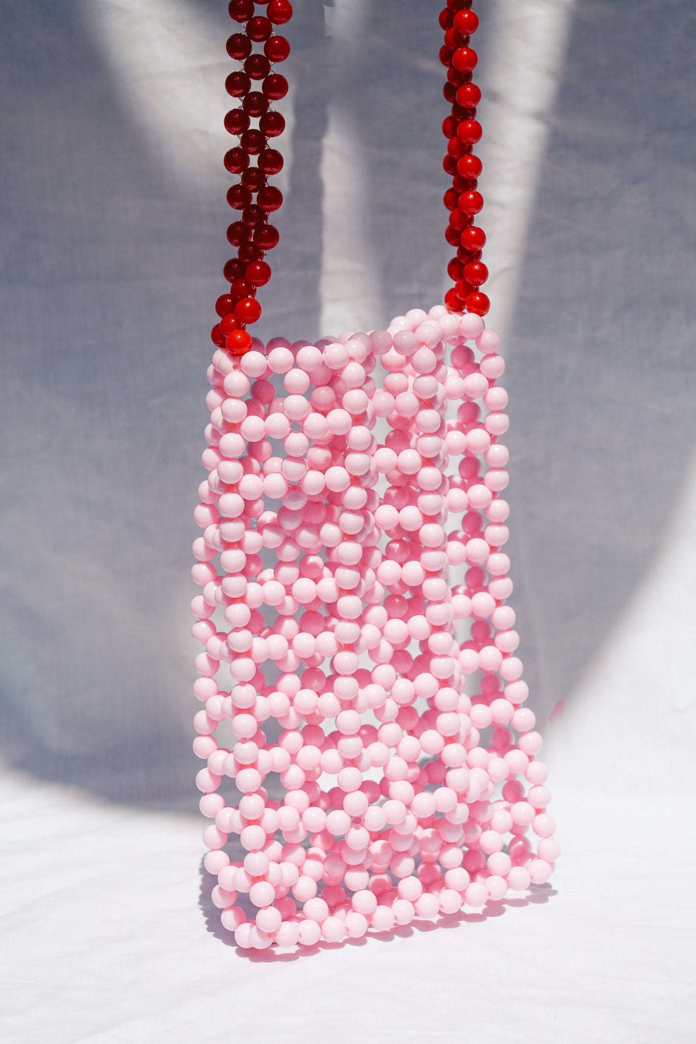 BEADED PHONE BAG - SOFT PINK & RED - HIBISCUS THE LABEL - Black Salt Co